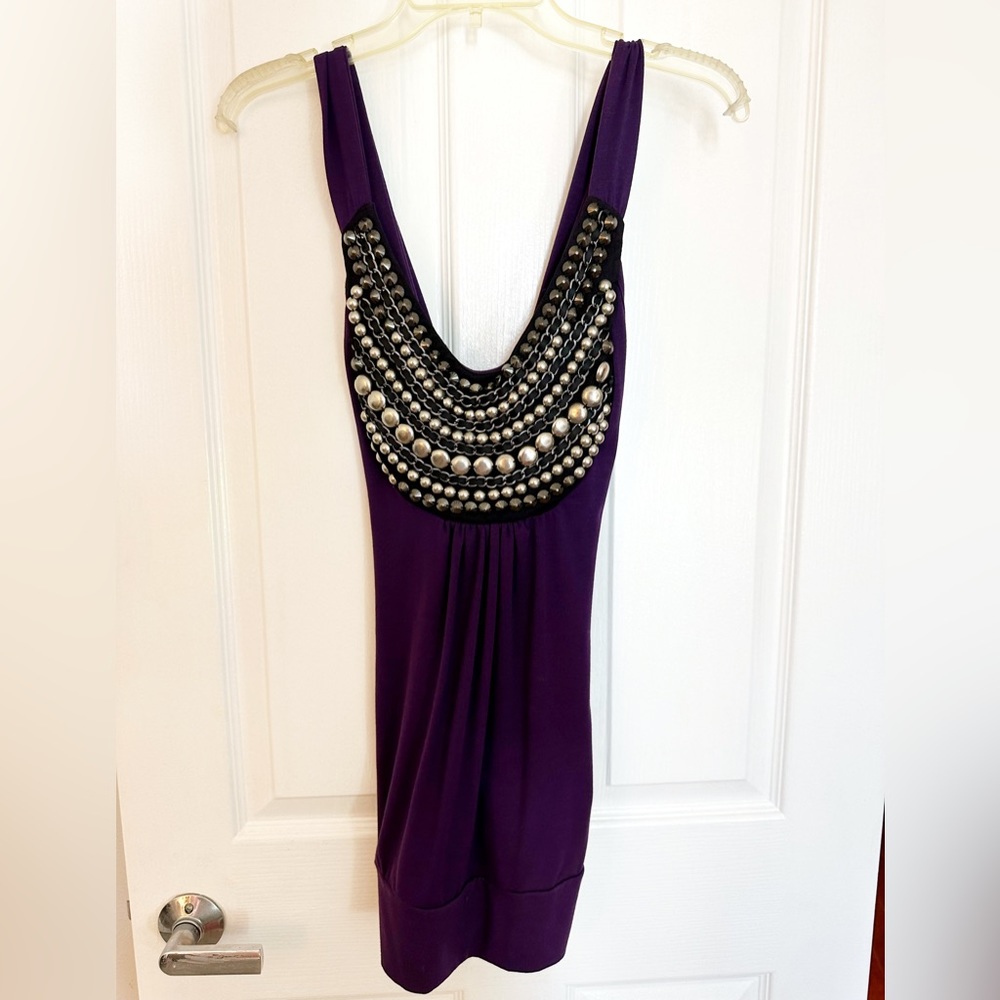 Deep purple tank top with cross cross back with hardware appliqué